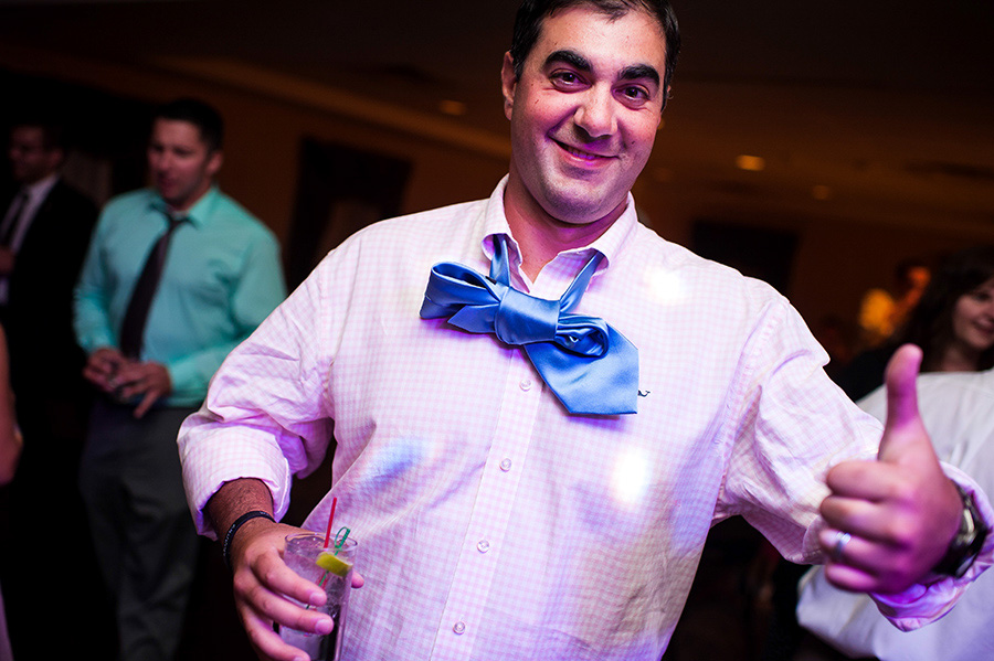 guy with tie bow tie giving thumbs up