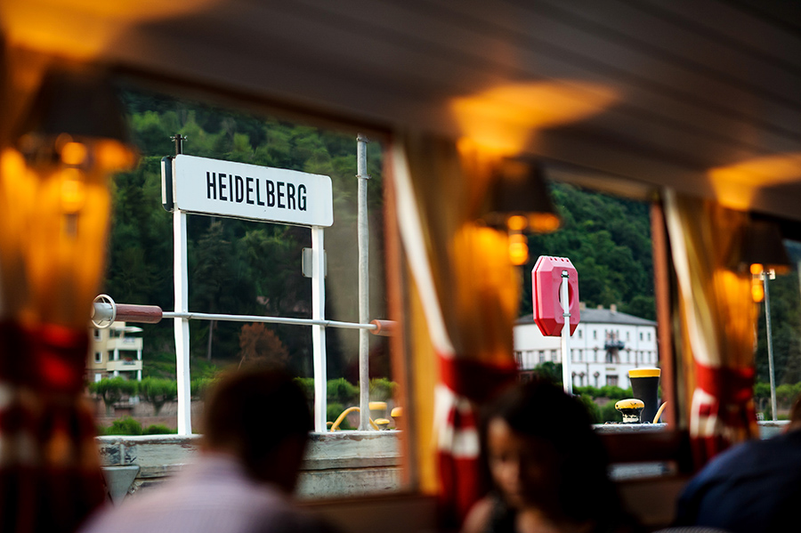Heidelberg sign visible outside of boat on wedding day.