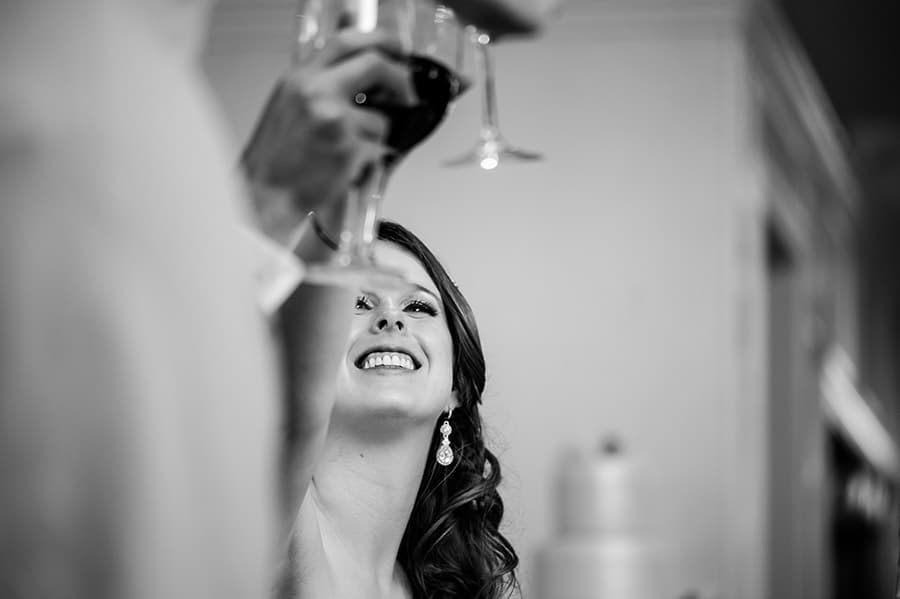 Close up of bride toasting with her wedding guests