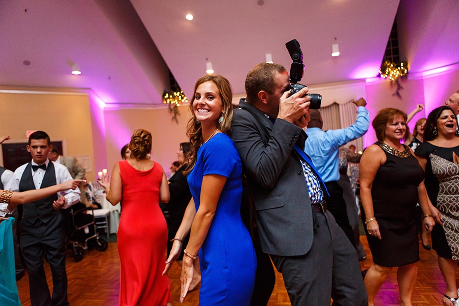 Fun Philadelphia Wedding photographer Dan Moyer and wedding guest dance.