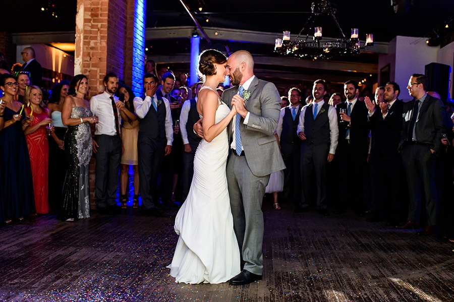 Bride and groom share first dance.