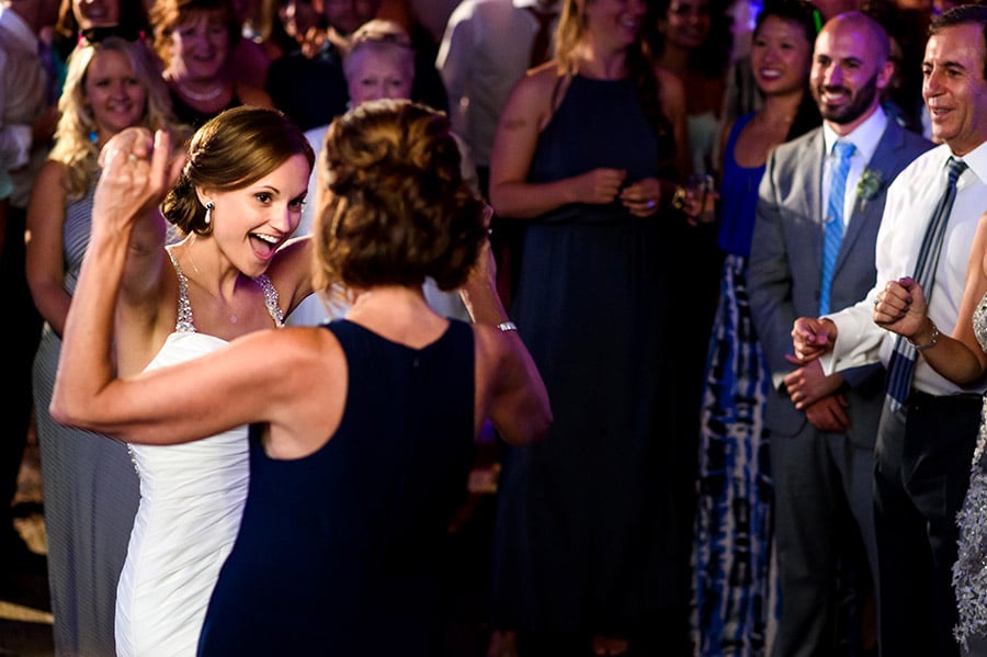 Bride and mom share a special dance on wedding day.
